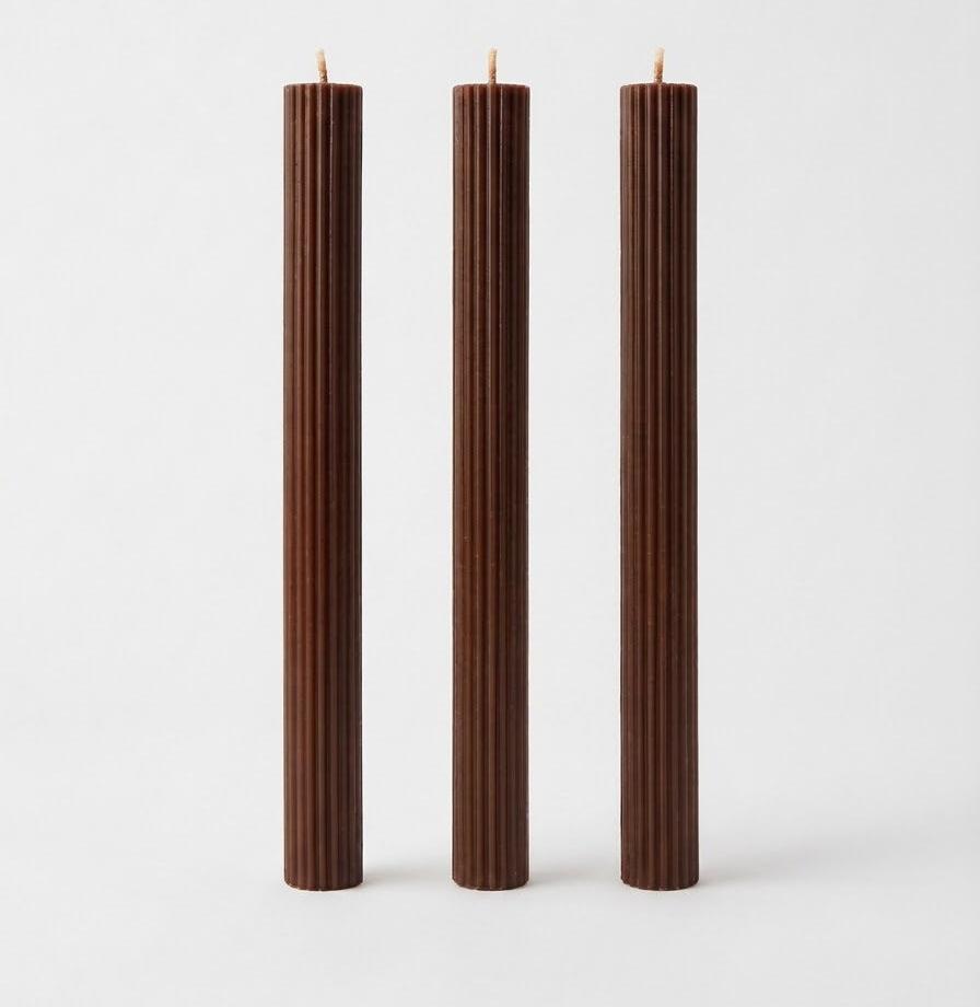 Brown Linear Elegance candles with straight sides and vertical ribs.