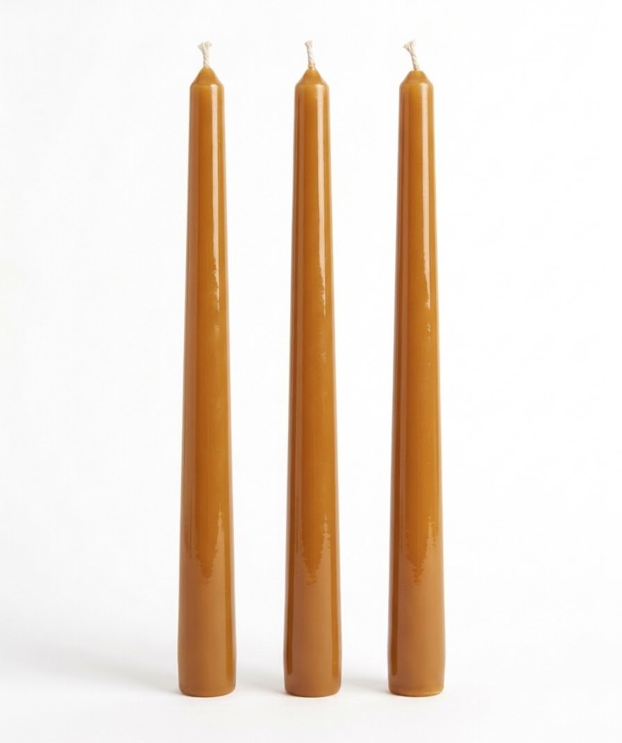 Caramel-colored Classic Elegance taper candles with smooth sides on a white background.
