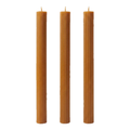 Caramel-colored Linear Elegance candles with straight sides and vertical ribs on a white background.