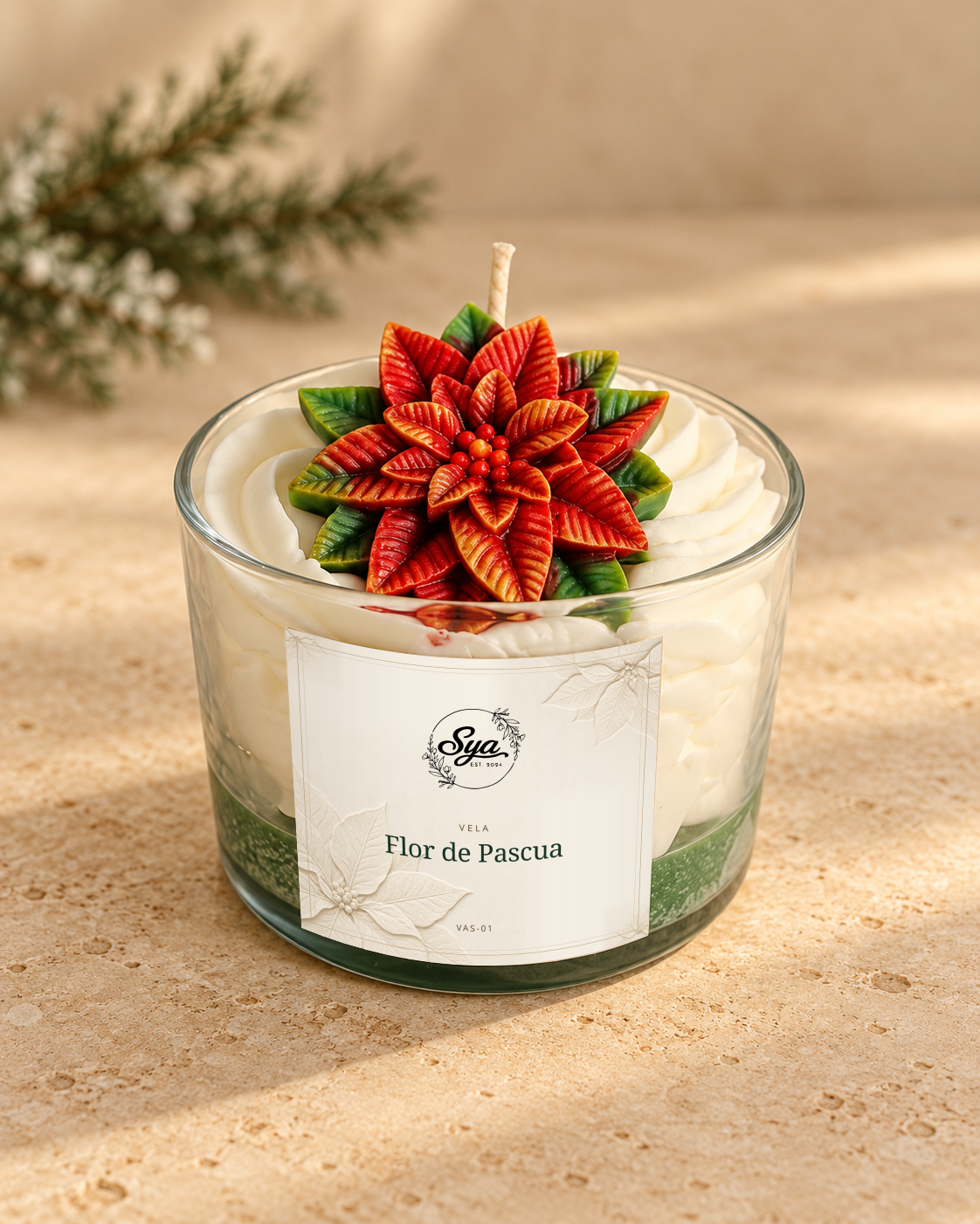 Vela con Flor de Pascua · propuesta visual de la colección Navidad de Sya.
