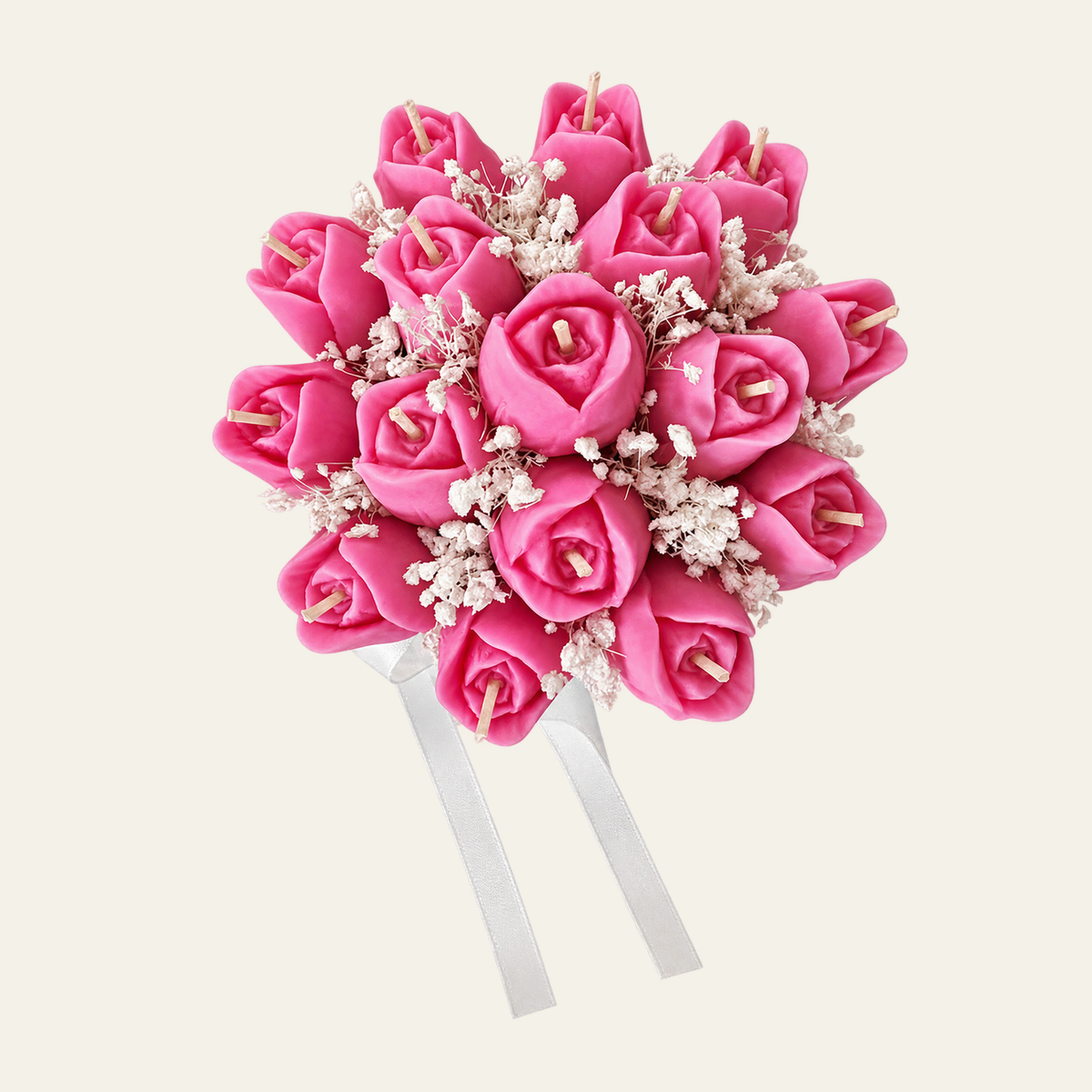 Tulip Bouquet arrangement of pink flower-shaped candles with small white flowers and a white ribbon.